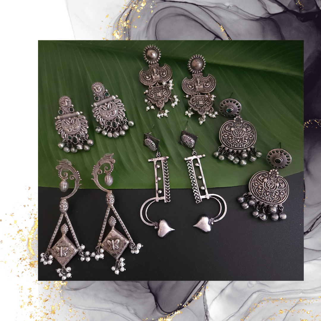 Aarthi silver alike earrings collection