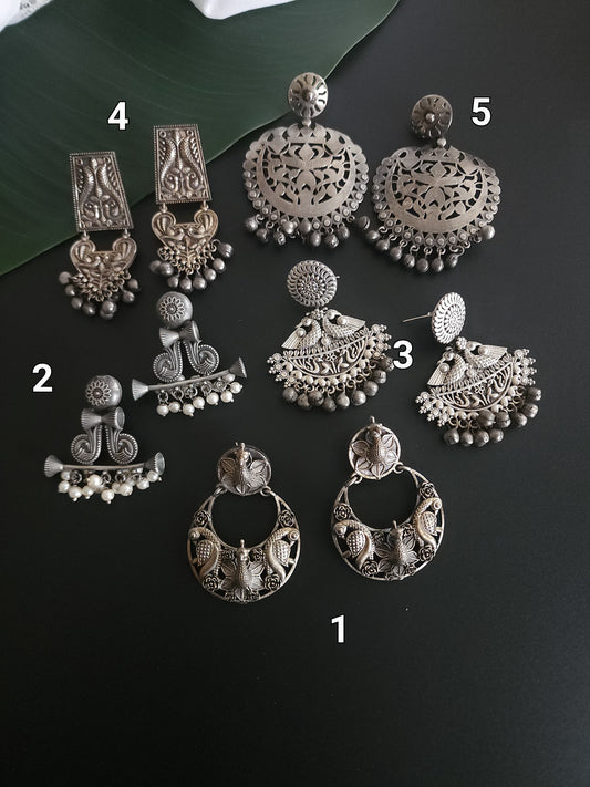 Aarthi silver alike earrings collection