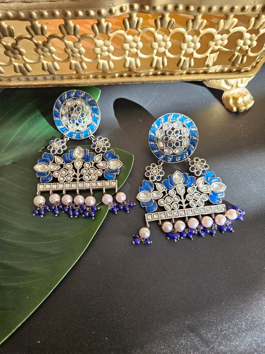 Anugna kemp silver alike earrings