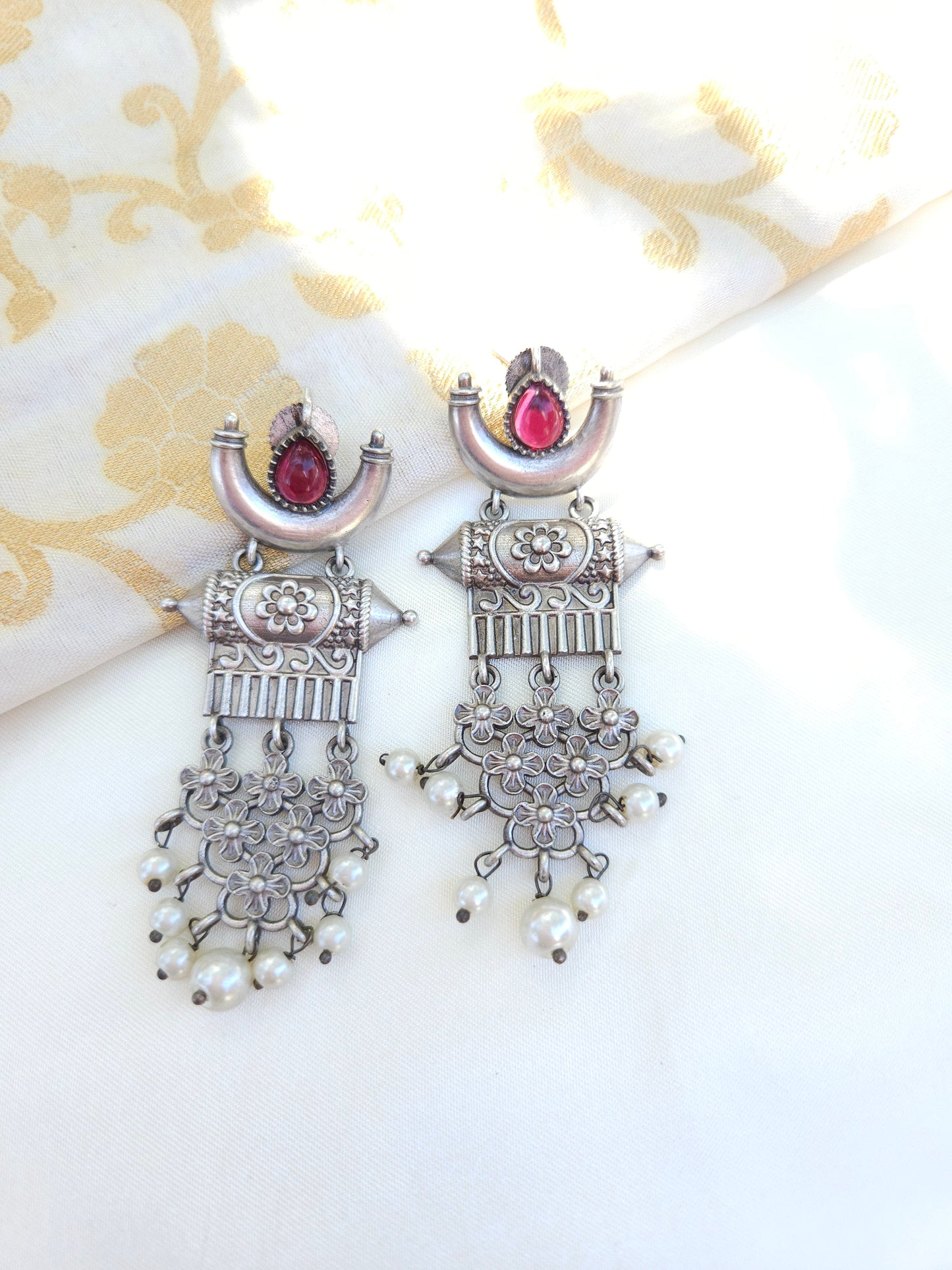 Aditya silver alike earrings