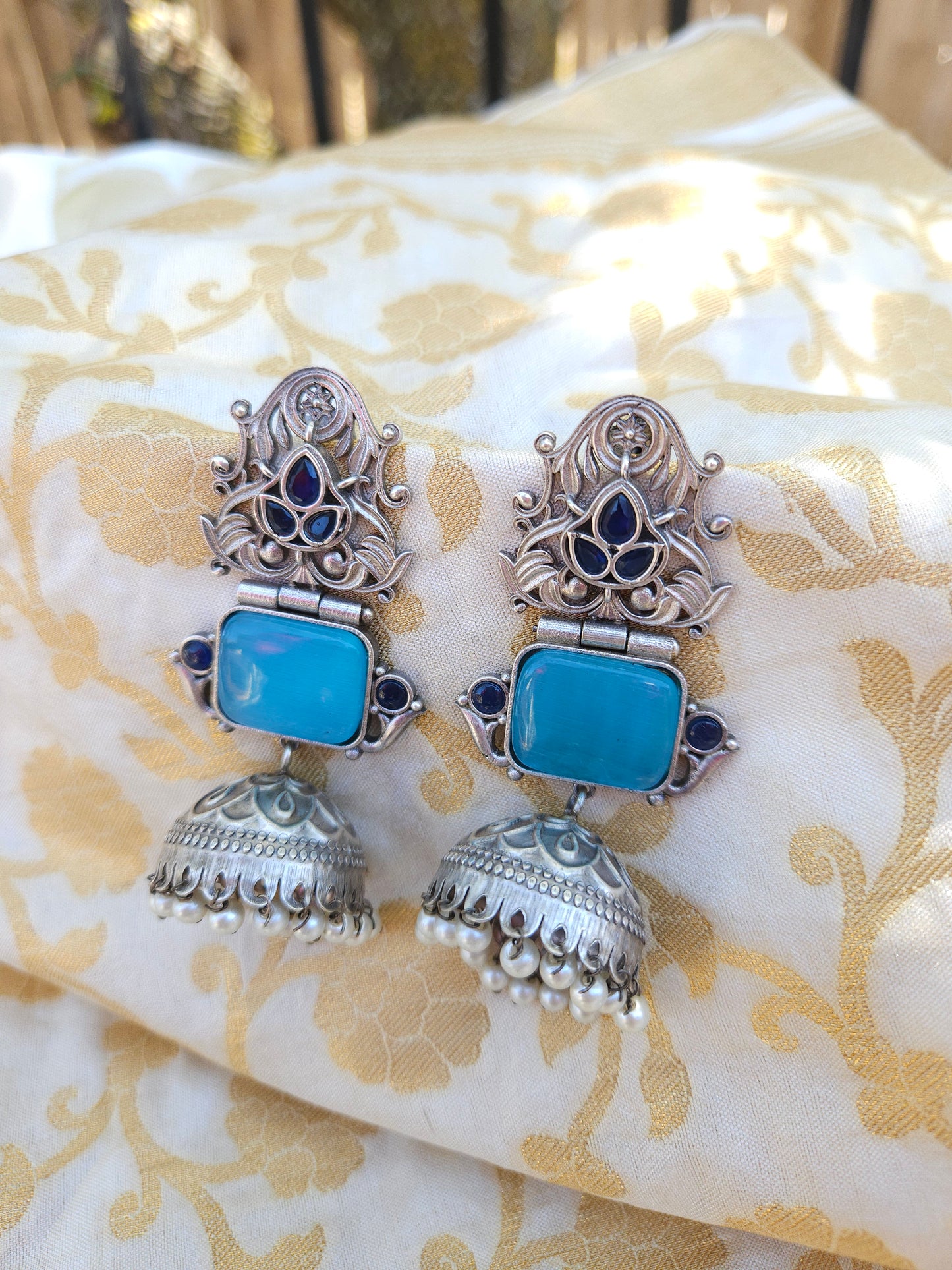 Aditya  silver alike jhumka earrings