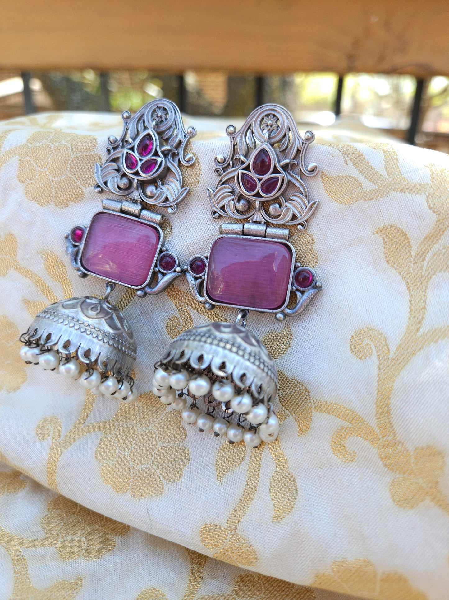 Aditya  silver alike jhumka earrings