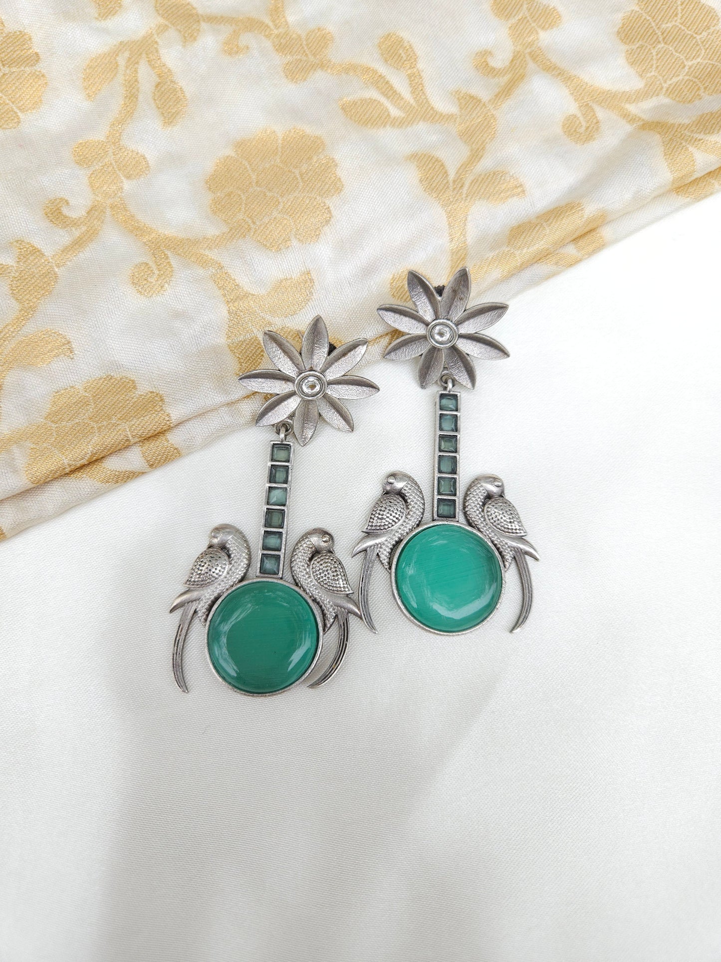 Aditya  silver alike earrings