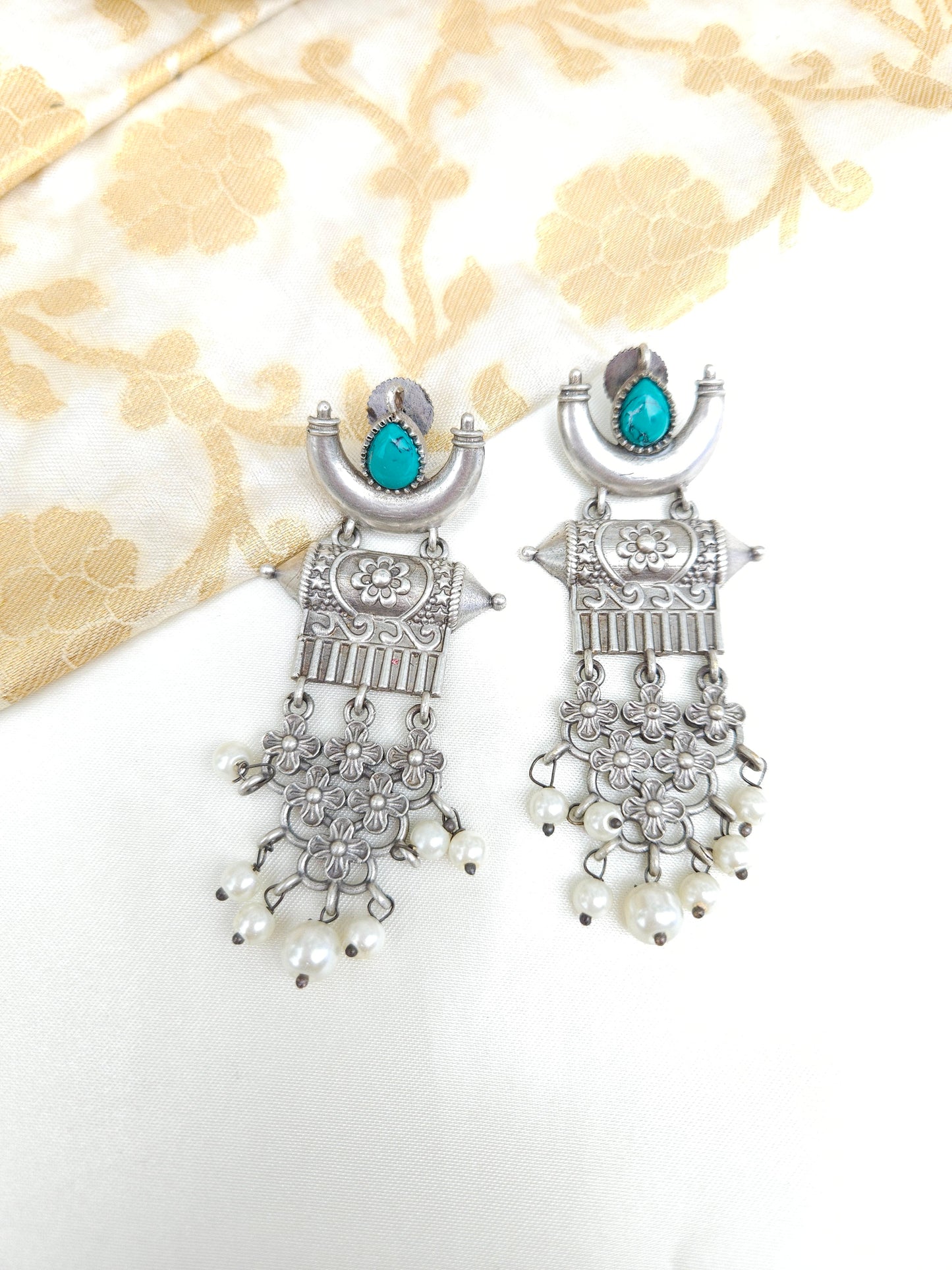 Aditya silver alike earrings