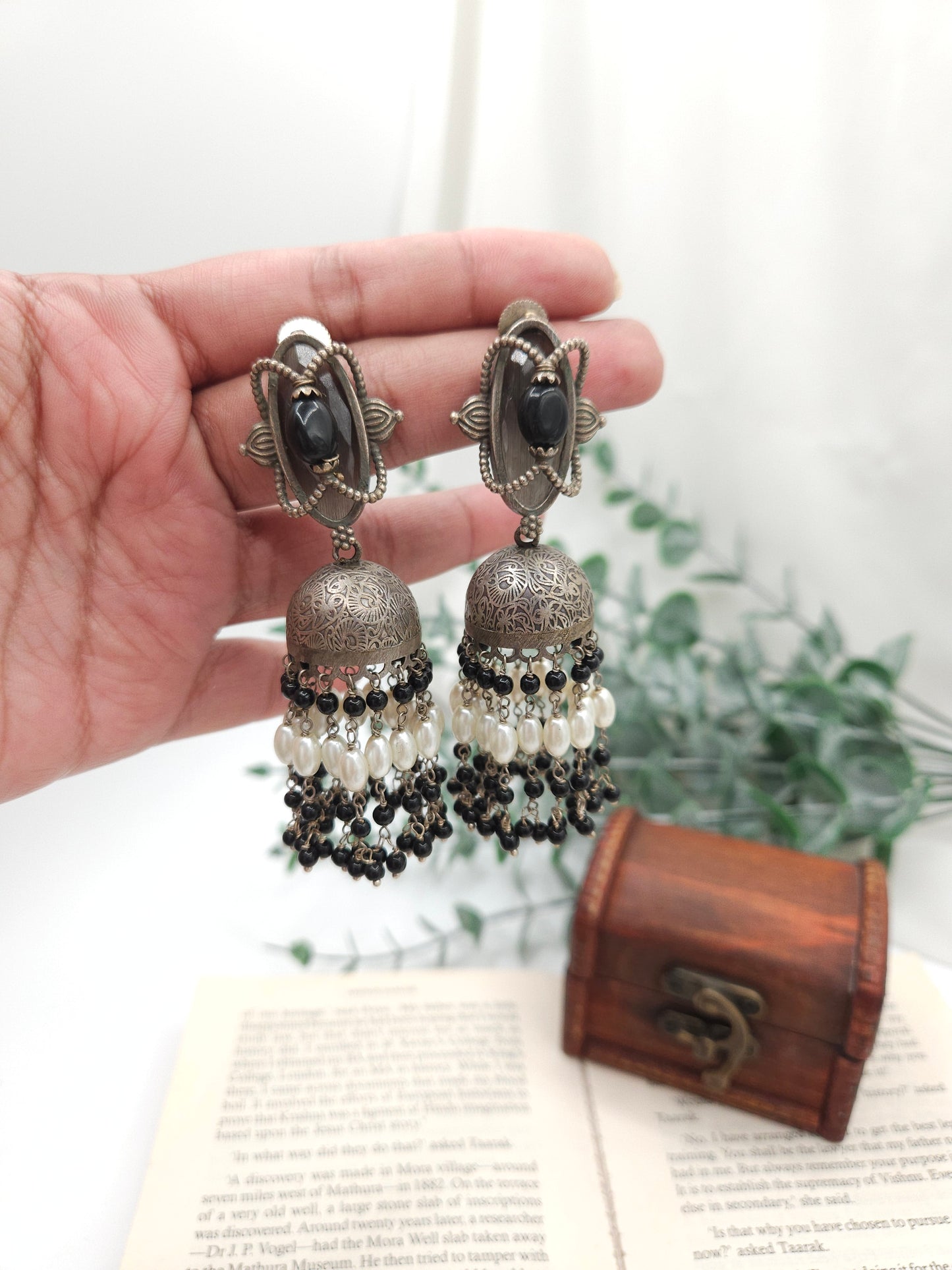 Maithri silver alike jhumka earrings