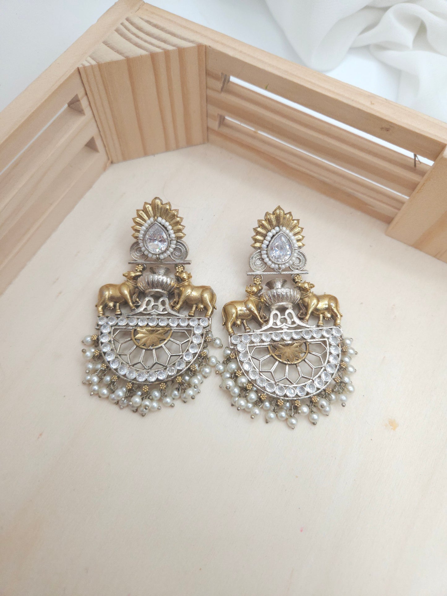 Dualtone silver alike earrings collection