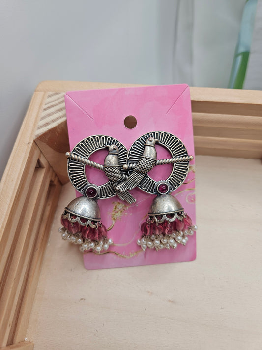 Aditya silver alike earrings