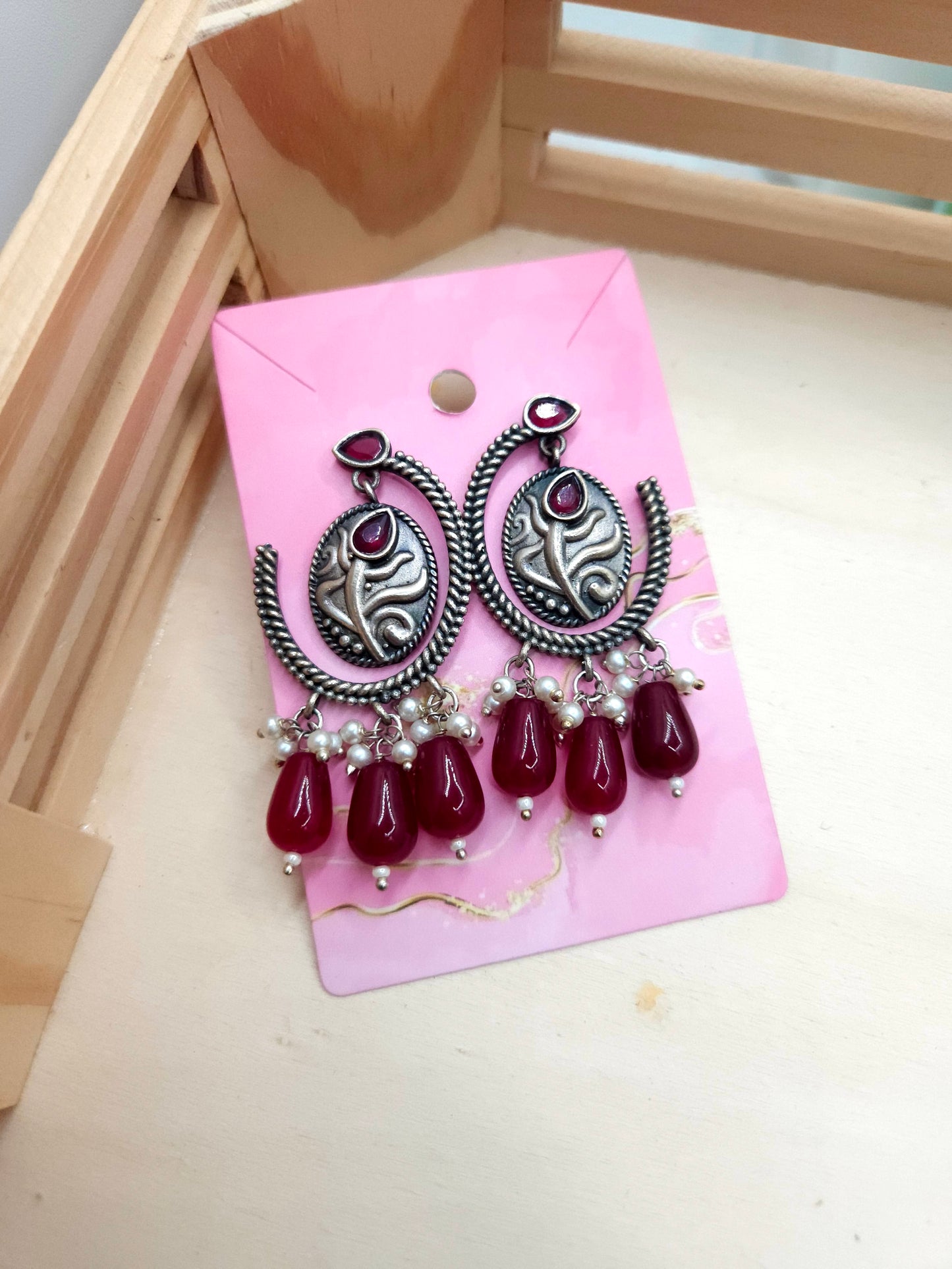 Aditya silver alike earrings