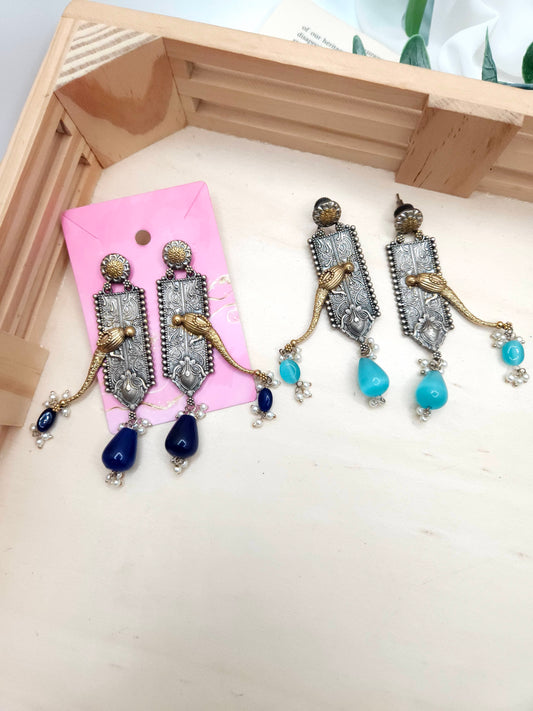 Aditya silver alike earrings