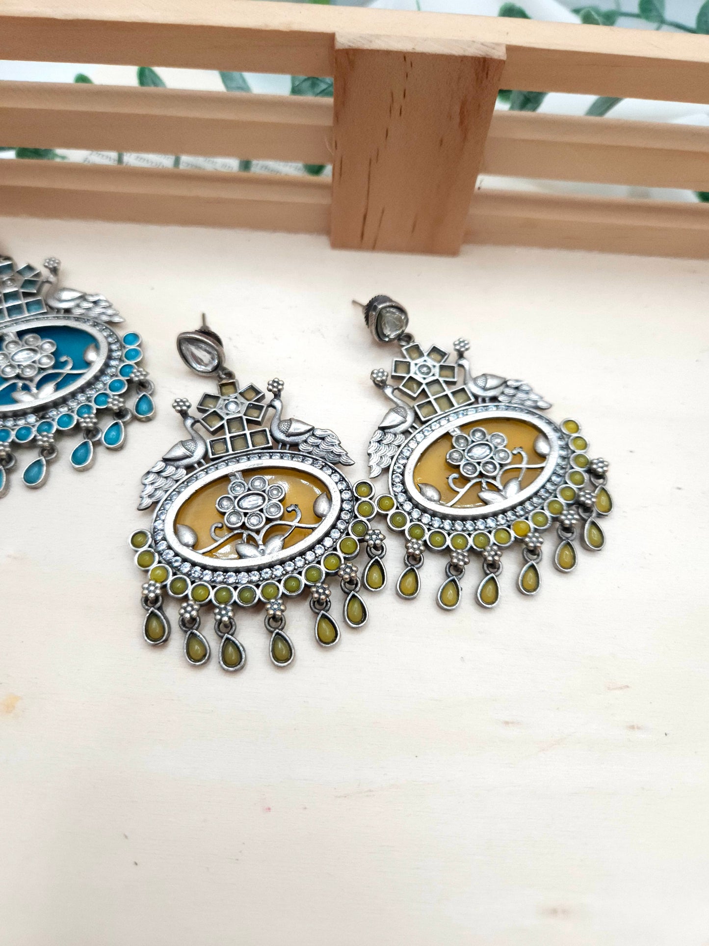 Aditya silver alike earrings