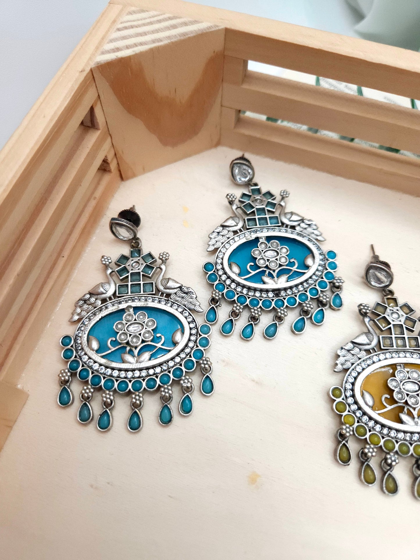 Aditya silver alike earrings