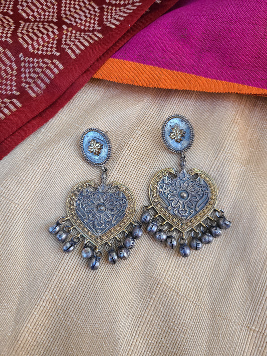 Chetna dual tone silver alike earrings