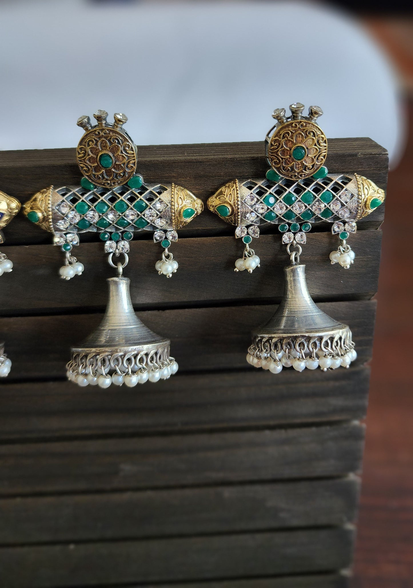 Aastha dualtone jhumka earrings