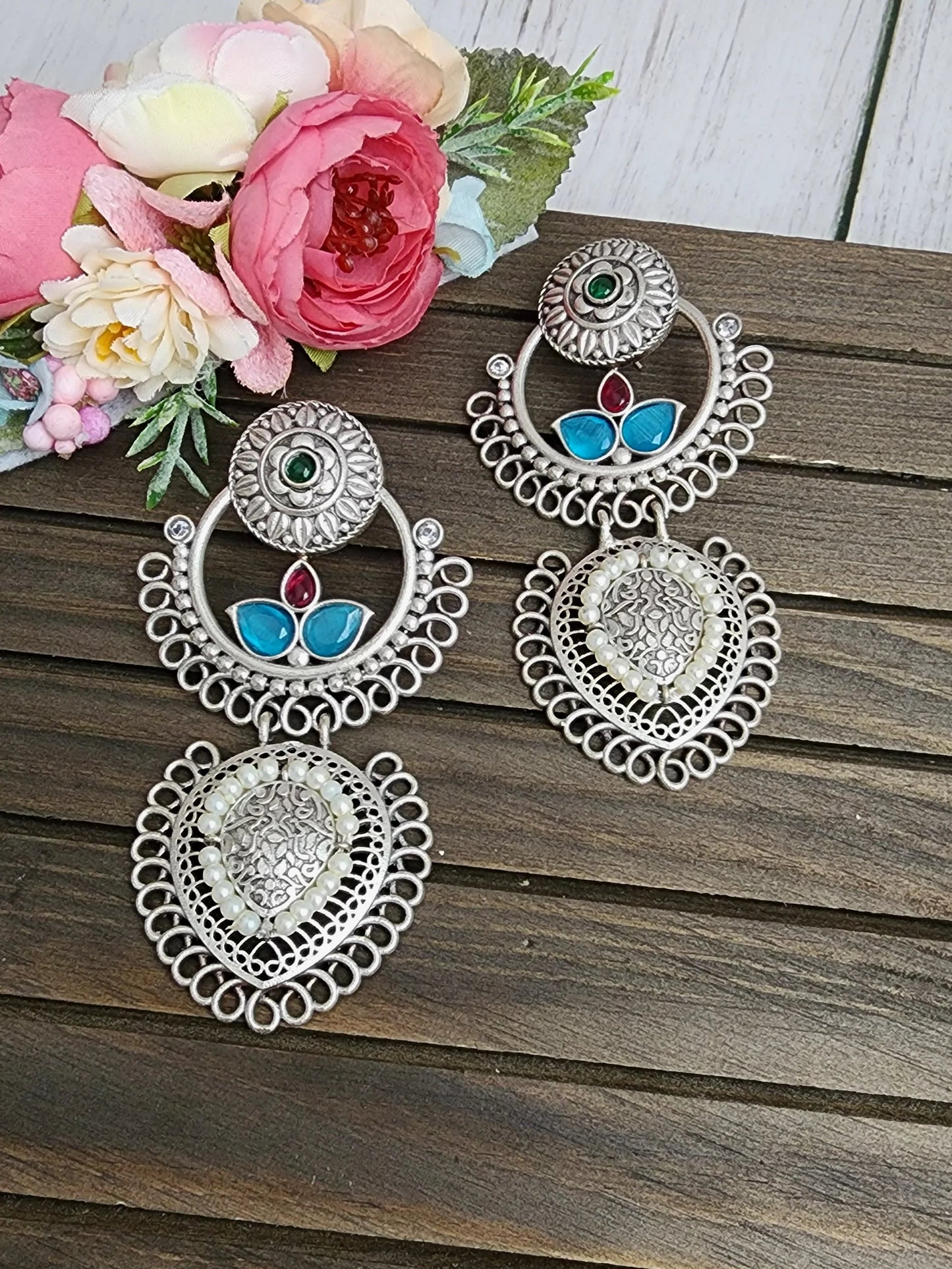 Poorvi silver alike earrings