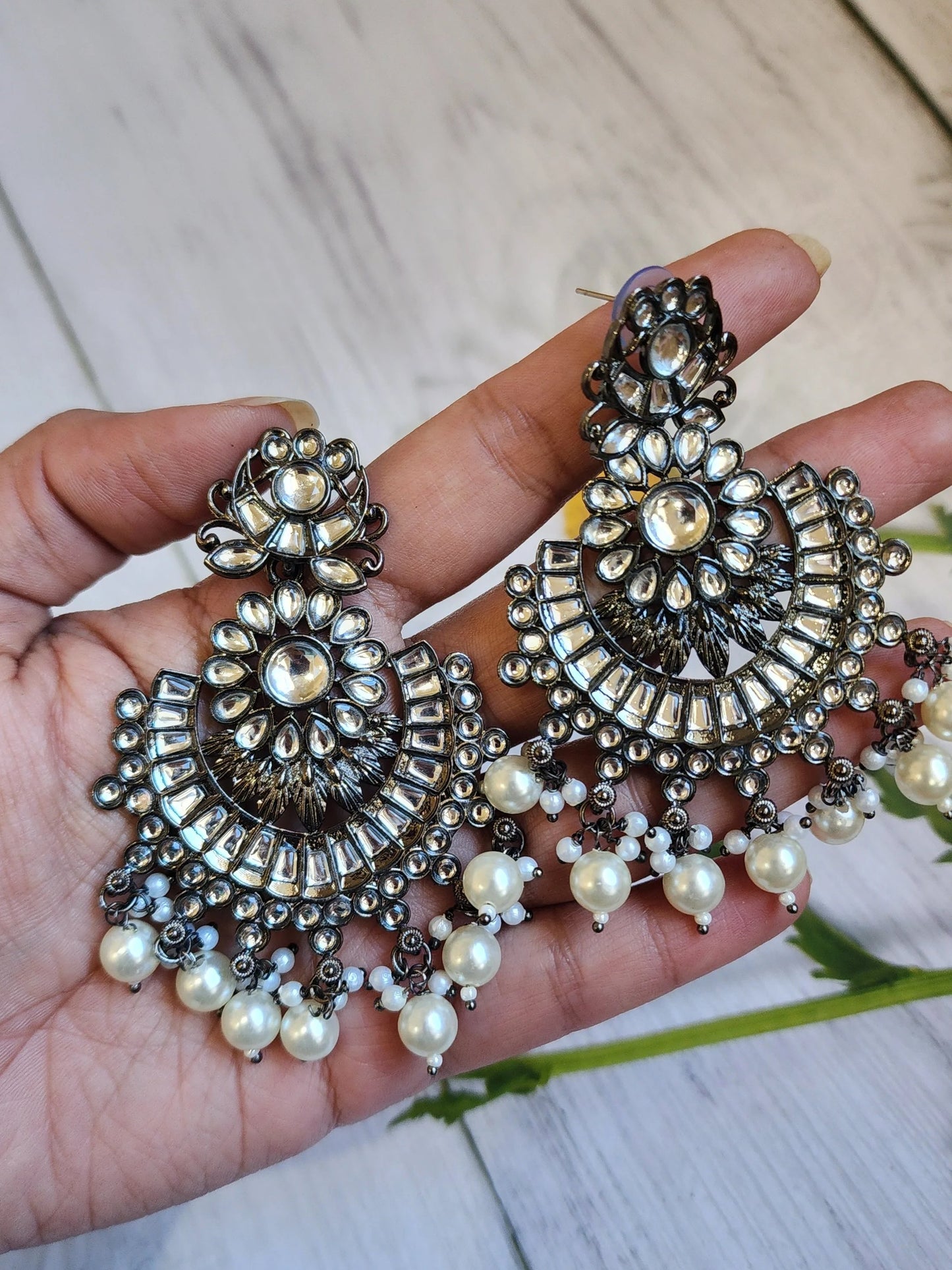 Black rodium plated jhumka earrings