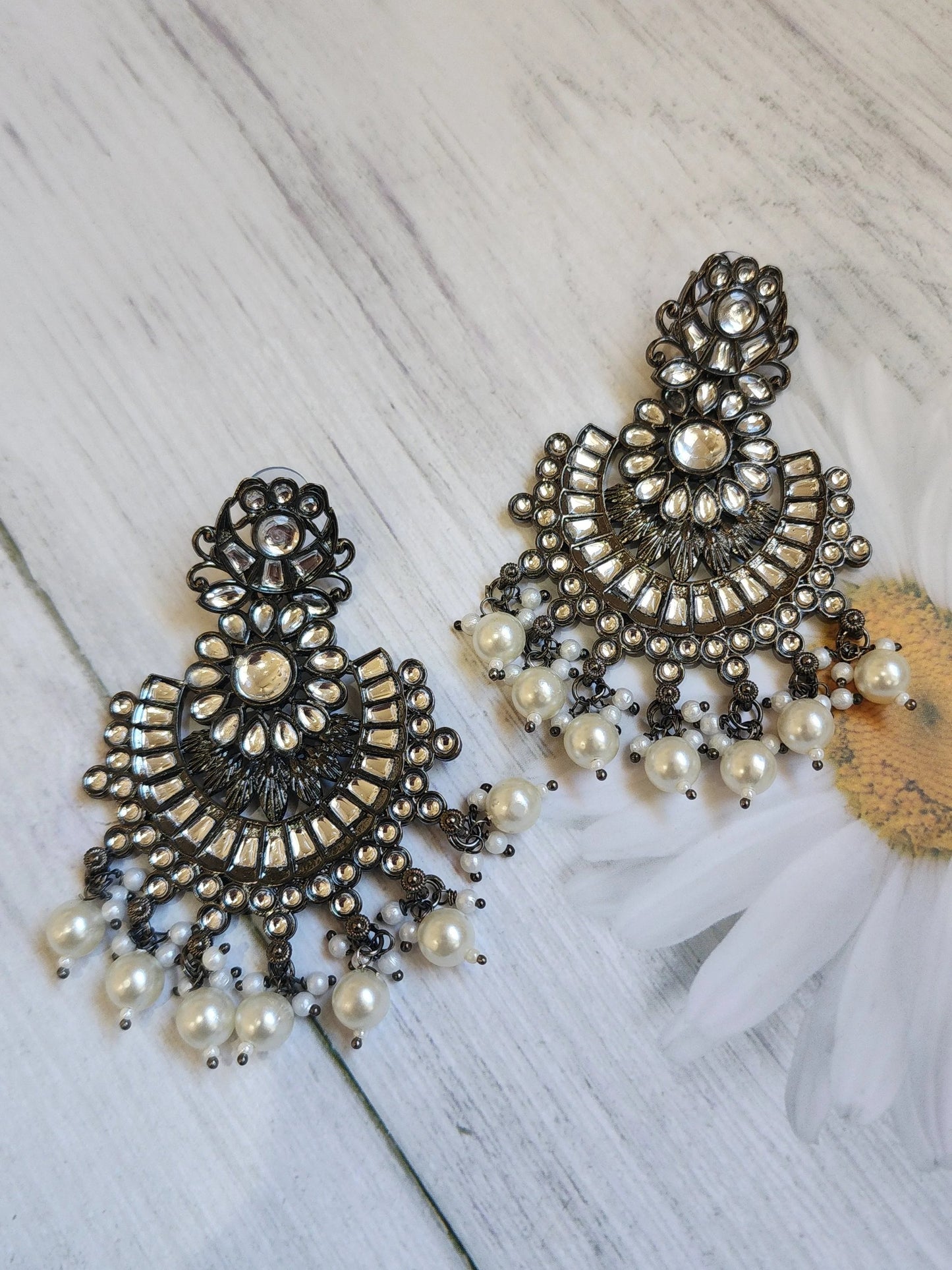 Black rodium plated jhumka earrings