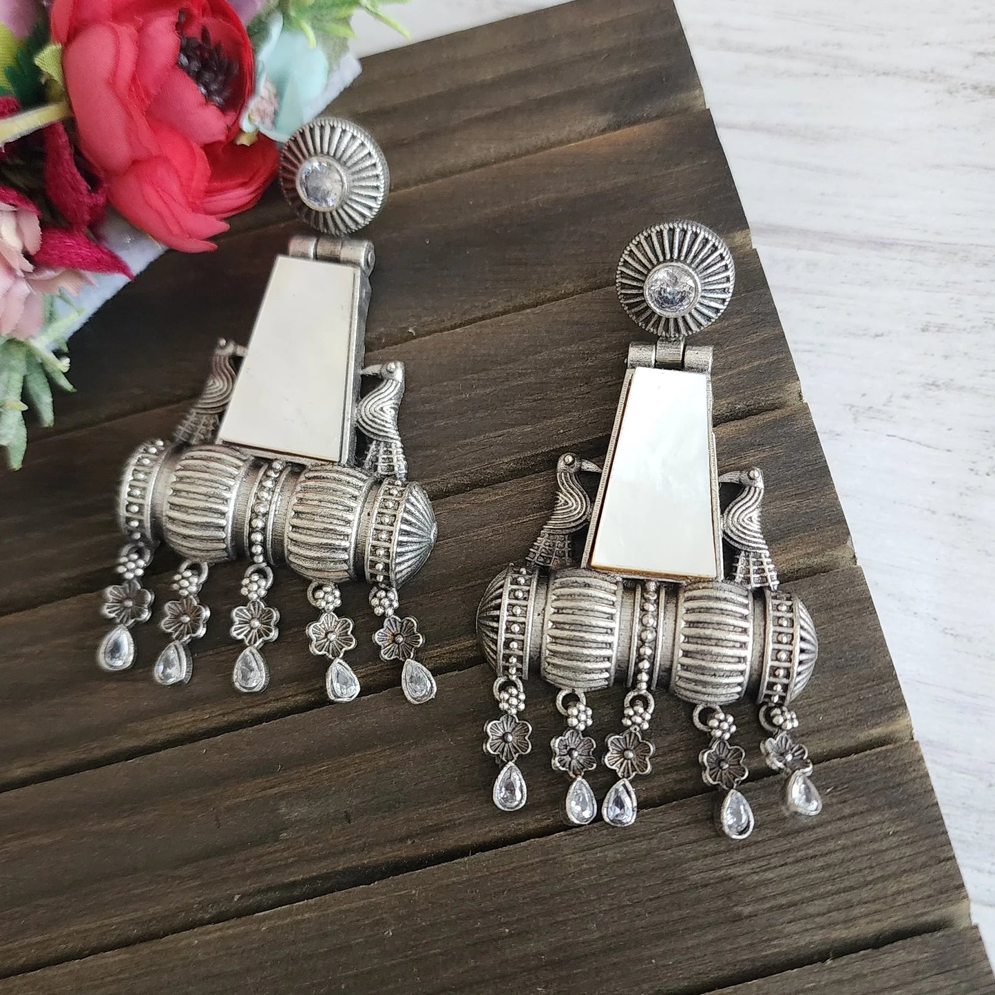 Unique silver alike earrings