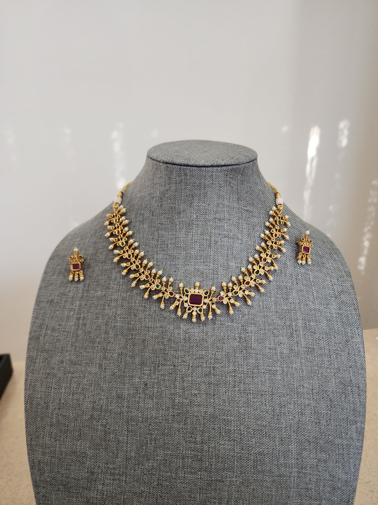 Beaded goldplated statement necklace set